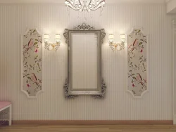 Frames with photos on the wall in the hallway