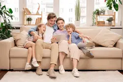 Photo of the whole family in the living room