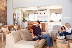Photo of the whole family in the living room