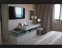 Photo of a bedroom with a table