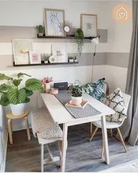 Shelves above the table in the kitchen interior photo