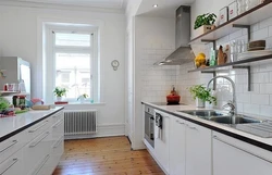 White kitchen design with white tiles