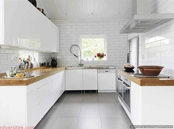 White kitchen design with white tiles