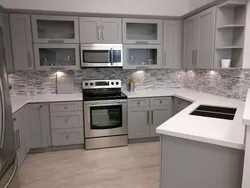 Light gray countertop in the kitchen interior