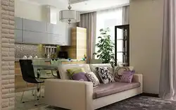 Дизайн кухни гостиной с диваном посередине