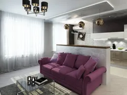 Kitchen living room design with sofa in the middle
