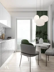 Green Chairs In The Interior Of A White Kitchen