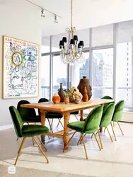 Green chairs in the interior of a white kitchen