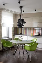 Green Chairs In The Interior Of A White Kitchen