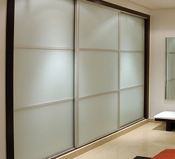 Wardrobe in the bedroom glass photo