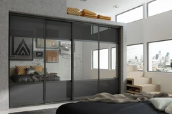 Wardrobe in the bedroom glass photo