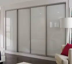 Wardrobe in the bedroom glass photo