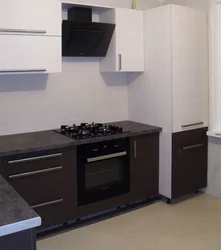 Kitchens with dark countertops and dark bottom photo