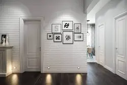 White Brick In The Interior Of The Hallway With Wallpaper