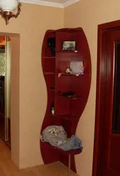 Corner shelves on the wall in the hallway photo