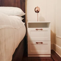 Chest of drawers in a small bedroom photo