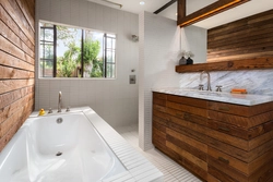 Wooden bathtub in the interior