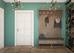 Green wardrobe in the hallway interior