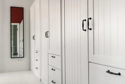 Handles on the hallway closet photo