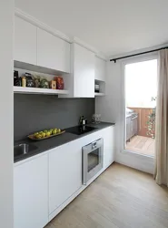 Kitchen On One Wall With A Refrigerator Photo
