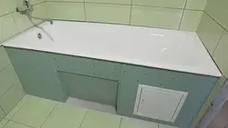 Sewing up the bathtub photo